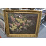 Floral subject, oil on canvas, in a large decorative gilt frame (faults).