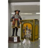 A model of a Cavalier and a pewter model of a soldier.