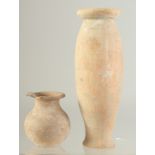 TWO EARLY POTTERY VASES.