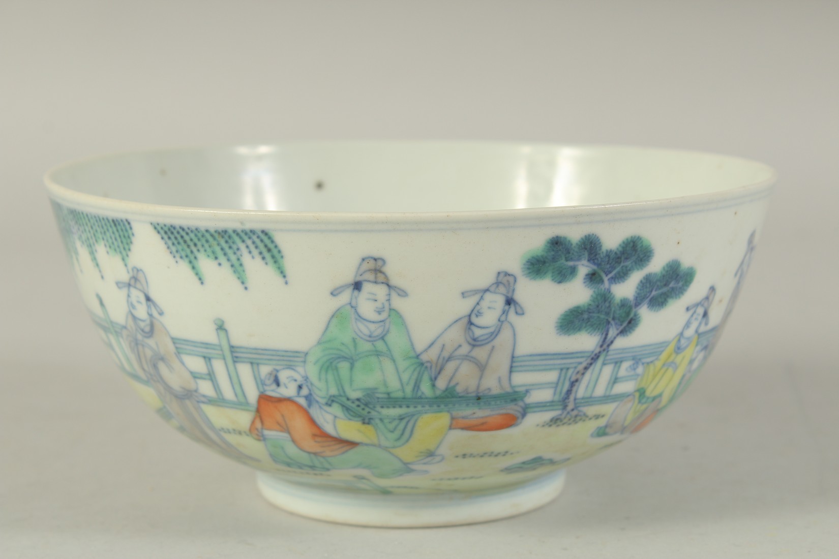 AN 19TH CENTURY CHINESE PORCELAIN BOWL, painted with various figures in an outdoor setting, the base - Image 4 of 7