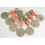 A BEADED METAL NECKLACE WITH ISLAMIC COINS.