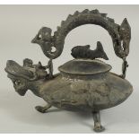 AN UNUSUAL CHINESE DRAGON FORM TEAPOT, the lid with fish shape finial, 19.5cm wide (spout to