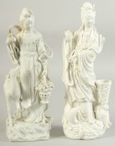 TWO LARGE BLANC-DE-CHINE GUANYIN FIGURES, 29cm and 28cm high.