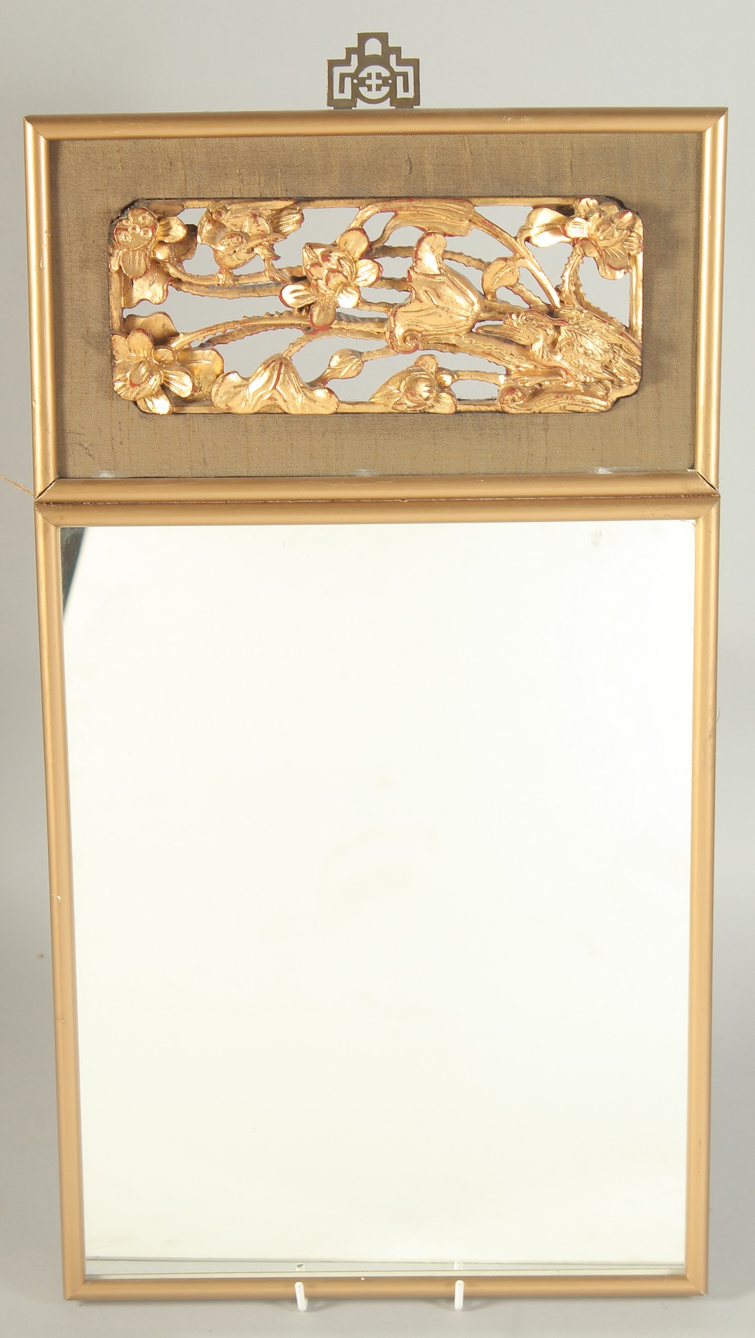 A CHINESE CARVED PANEL INSET MIRROR.