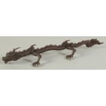 A JAPANESE BRONZE OKIMONO OF A DRAGON, character mark to underside, 15.5cm long.