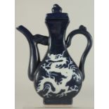 A CHINESE SACRIFICIAL BLUE GLAZE LIDDED EWER, with incised white dragon, 29cm high.