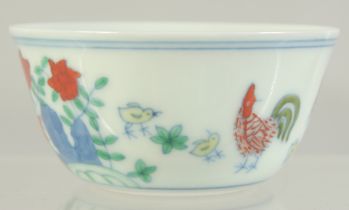 A CHINESE DOUCAI PORCELAIN CHICKEN CUP, 8cm diameter.