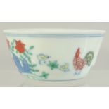 A CHINESE DOUCAI PORCELAIN CHICKEN CUP, 8cm diameter.