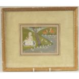 AN 18TH CENTURY INDIAN PAHARI MINIATURE PAINTING, depicting a sadhu meditating by a river, framed