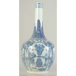 A CHINESE BLUE AND WHITE PORCELAIN BOTTLE VASE, painted with panels of beasts and objects, the