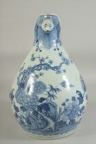 A LARGE 18TH CENTURY CHINESE BLUE AND WHITE PORCELAIN JUG, painted with native flora and with