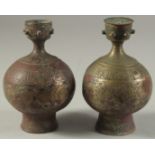 TWO 12TH-13TH CENTURY PERSIAN SELJUK KHURASAN BRONZE ROSEWATER SPRINKLERS with Kufic calligraphy,