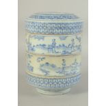 CHINESE BLUE AND WHITE PORCELAIN STACKING RICE BOWLS AND COVER, painted with figures in a garden,