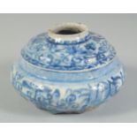 A 17TH CENTURY PERSIAN SAFAVID BLUE AND WHITE GLAZED POTTERY SQUATTED VASE, 15cm diameter.