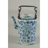 A 19TH-20TH CENTURY CHINESE BLUE AND WHITE TEAPOT, possibly for the Thai market, 25cm high (