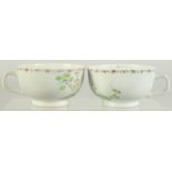 A PAIR OF FAMILLE ROSE PORCELAIN CUPS, with European subjects, cups 8.5cm diameter.