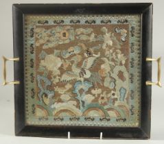 A CHINESE EMBROIDERED SILK TEXTILE INSET TRAY, textile 26.5cm x 27cm.