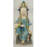 A CHINESE FAHUA-TYPE GUANYIN, 27.5cm high.