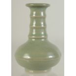 A SMALL CHINESE CELADON GLAZE VASE, 10cm high.