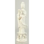 A BLANC-DE-CHINE FIGURE OF GUANYIN, 18cm high.