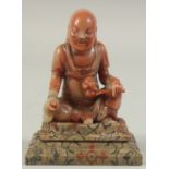 A CHINESE REPUBLIC PERIOD SOAPSTONE LUOHAN FIGURE AND STAND. figure 8cm high.
