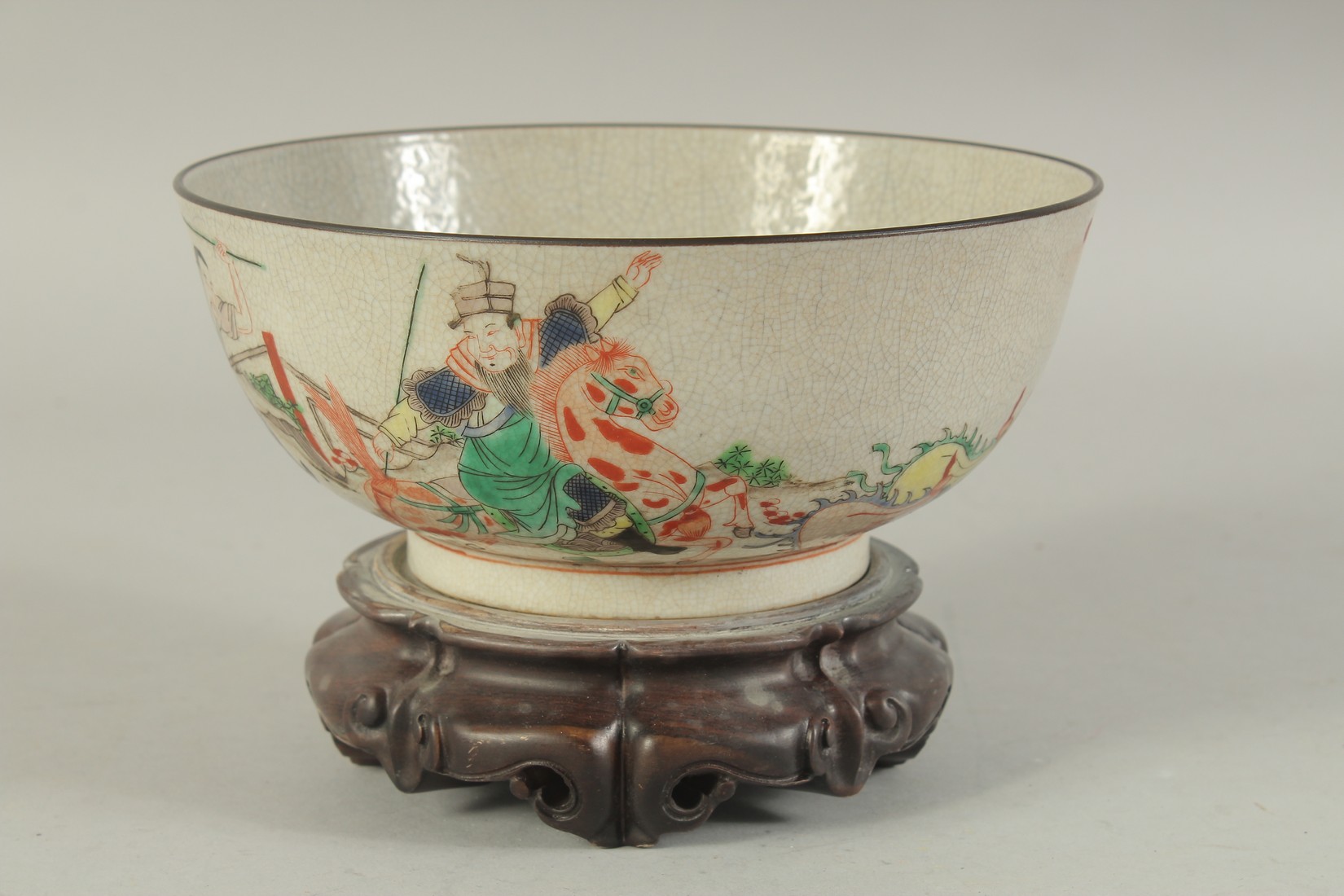 A CHINESE FAMILLE VERTE PORCELAIN BOWL - possibly Qing dynasty, with hardwood stand, the exterior - Image 3 of 7