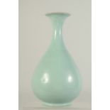 A CHINESE CELADON RU WARE BOTTLE VASE, 28cm high.