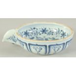 A CHINESE BLUE AND WHITE PORCELAIN SPOUTED BOWL, painted with phoenix, 14cm diameter (excluding