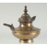 A 17TH-18TH CENTURY INDIAN BRASS SQUAT-FORM EWER, 17cm wide (including spout).