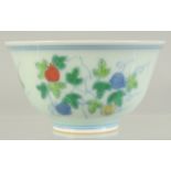 A CHINESE DOUCAI PORCELAIN CUP, decorated with fruits, 8.5cm diameter.