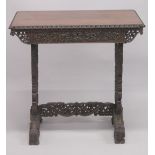 A FINE 19TH CENTURY ANGLO-INDIAN TABLE, with finely carved and pierced folaite skirt and legs,