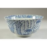A CHINESE 18TH CENTURY BLUE AND WHITE PORCELAIN BOWL, painted with floral decoration, character mark