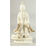 A CHINESE POTTERY FIGURE, 32cm high.