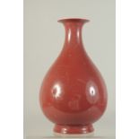 A CHINESE RED GLAZE PORCELAIN VASE, the base with six-character mark, 25cm high.