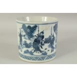 AN EARLY 20TH CENTURY CHINESE BLUE AND WHITE PORCELAIN BRUSH POT, decorated with figures, 17cm