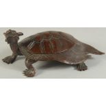 A JAPANESE BRONZE OKIMONO OF A MINOGAME TURTLE, character mark to underside, 11.5cm long.