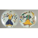 A PAIR OF TURKISH KUTAHYA DISHES, 14cm diameter.