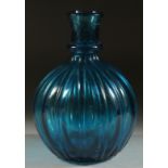 AN 18TH CENTURY MUGHAL GLASS HUQQA BASE, 18cm high.