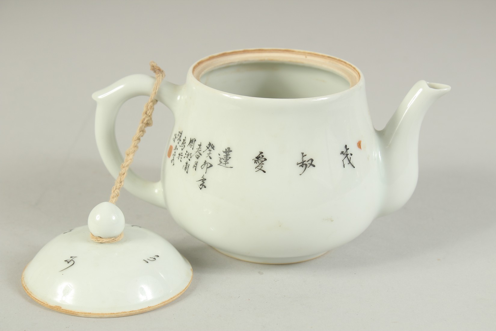 A CHINESE REPUBLIC PERIOD POLYCHROME PORCELAIN TEAPOT, painted with seated figures and characters. - Image 5 of 6