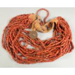 A GOOD CORAL BEADED MULTI-ROW NECKLACE.