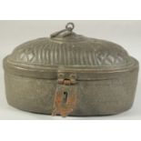 A MAMLUK TINNED COPPER OVAL FORM CANTEEN, with engraved decoration, 34cm x 21cm.