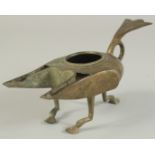 A RARE 12TH-13TH CENTURY ANDALUSIAN SPANISH ALMOHAD BRONZE DOUBLE-SPOUTED OIL LAMP, 23cm long.