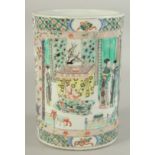 A CHINESE FAMILLE VERTE PORCELAIN BRUSH POT, decorated with panels of figures, the base with six-