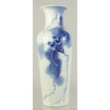 AN EARLY 20TH CENTURY CHINESE BLUE AND WHITE PORCELAIN VASE, painted with birds on a branch with