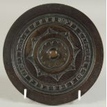 A CHINESE HAN STYLE BRONZE MIRROR, 16cm diameter.