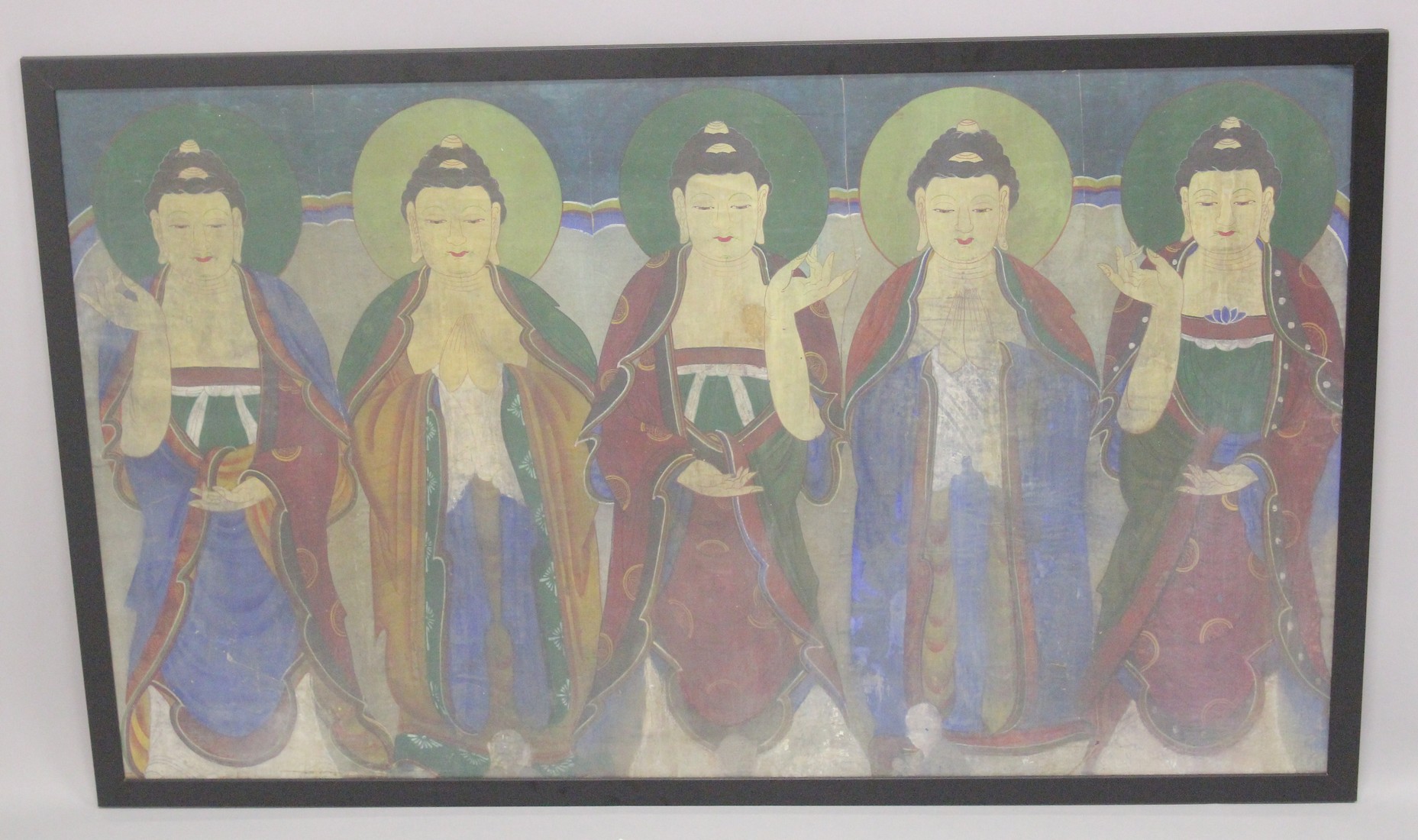 A FINE 19TH CENTURY PAINTING 'FIVE BUDDHAS', framed and glazed, image 71cm x 119.5cm.
