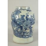 A LARGE CHINESE REPUBLIC PERIOD BLUE AND WHITE JAR, painted with exotic bird and native flora, (