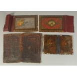 A COLLECTION OF THREE PERSIAN QAJAR BINDINGS, each with miniature painting to the cover, together