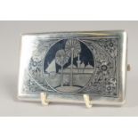 AN IRAQI SILVER NIELLO CIGARETTE CASE, inscribed to reverse, 8cm x 12.5cm.