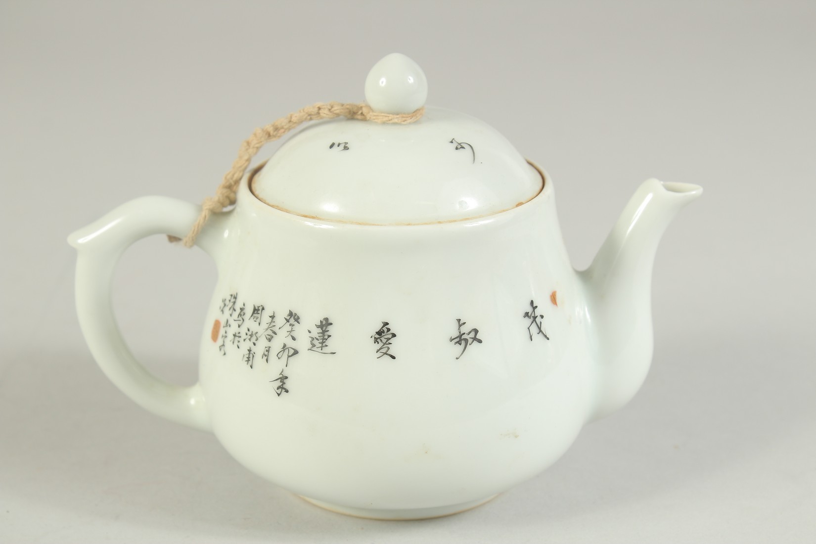 A CHINESE REPUBLIC PERIOD POLYCHROME PORCELAIN TEAPOT, painted with seated figures and characters. - Image 3 of 6